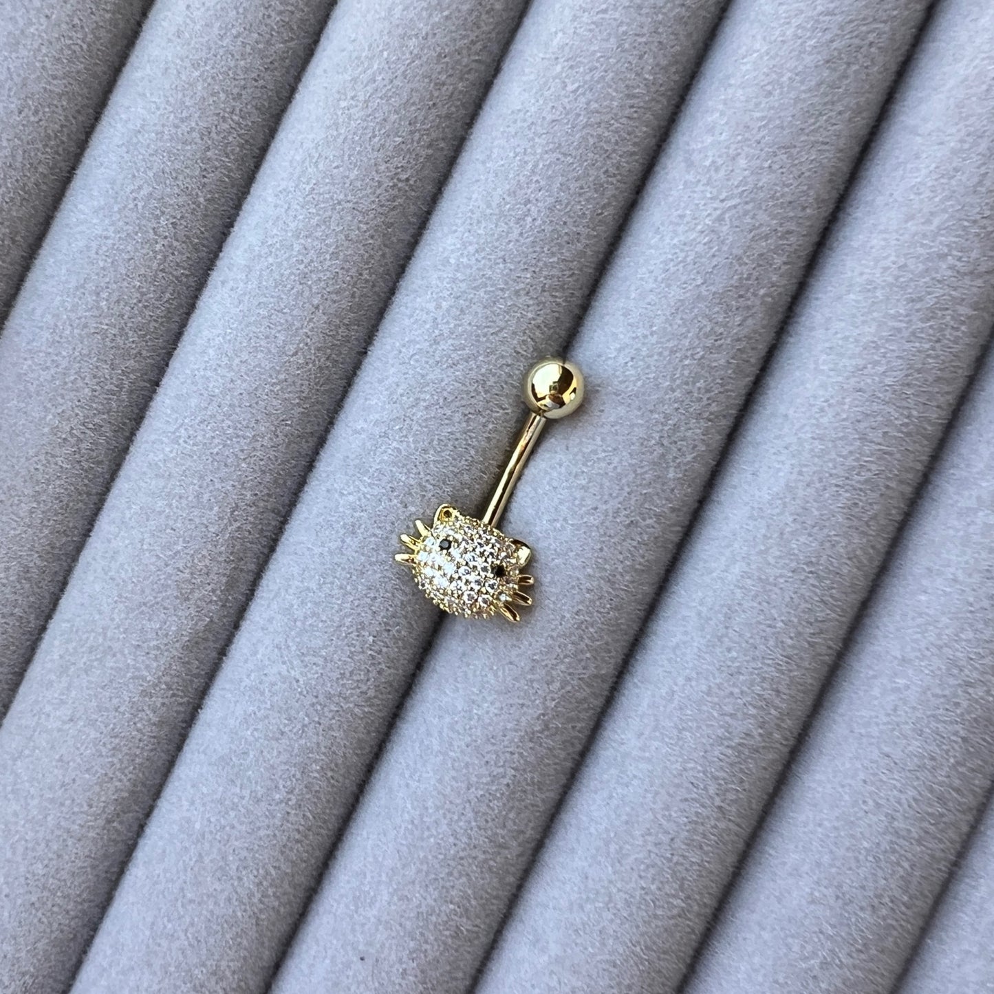 Kitty belly Piercing