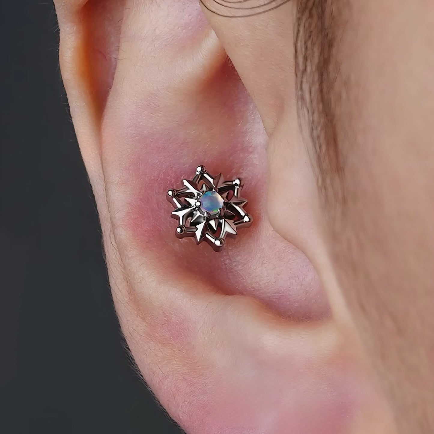 Titanium Tribal Sun Flat Ear Piercing