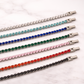 Set of colorful hair clips on a white background with 'Kalopsis' branding.