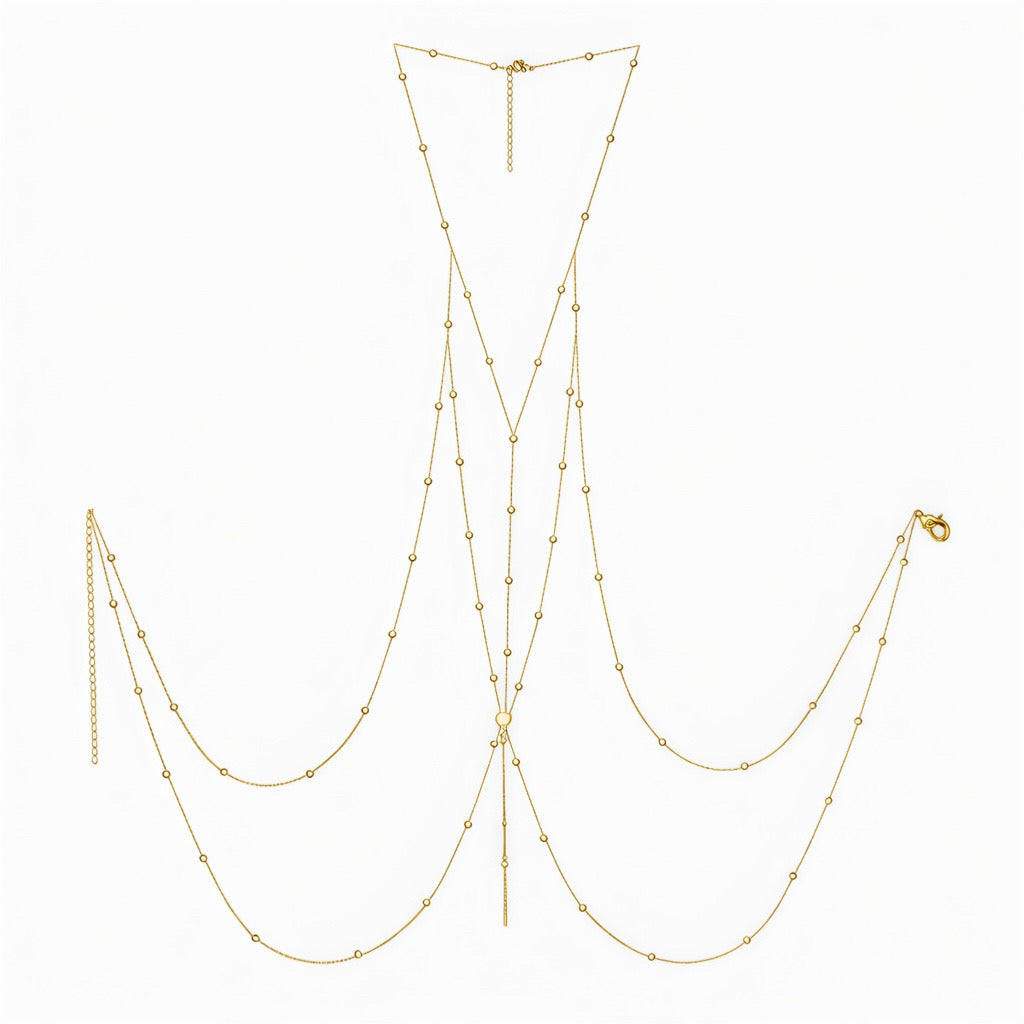 A delicate gold chain necklace with multiple draped chains, small bead details, and an adjustable clasp, displayed on a clean white background.